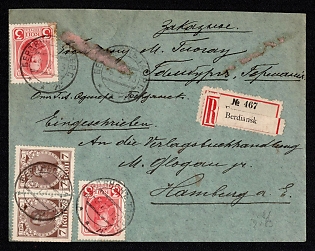 1913 RUSSIAN EMPIRE Envelope of registered letter sent internationally from Berdyansk to Hamburg (Germany). Franked with Romanov series stamps for 20kop. Corresponds to current rate for registered letters. Cancelled by the cachet of Berdyansk. Combined bilingual registration label of Berdyansk and arrival postmark of Hamburg on reverse.
