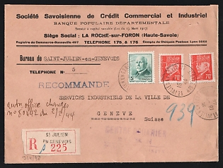 1944 (Feb. 18) Registered Remittance cover from Vichy France to Geneva, Switzerland Municipal Industrial Services franked with 5fr Petain single and two 70c singles tied by 'St. Julien en Genevois / Haute Savois' postmarks. German Wehrmacht Censor's tape on reverse tied by circular cachet. 'Geneve l' arrival backstamp (Feb. 28). Insignificant staple holes at top-right, Second World War