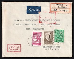 1946 (Dec) Turkey: Double-Weight Registered-Airmail commercial cover to Switzerland franked with 2k Green Oranges, 100k Nönü, and 4k Soldier Postal Tax tied by 'Istanbul' postmarks with Registration label alongside. Swiss 'Basel' and 'Pratelln' backstamps (both Dec. 16)