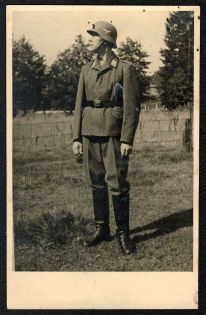 1940 Unmailed Agfa photo post card depicting a young, undecorated member of the Luftwaffe judging by the insignia on his helmet